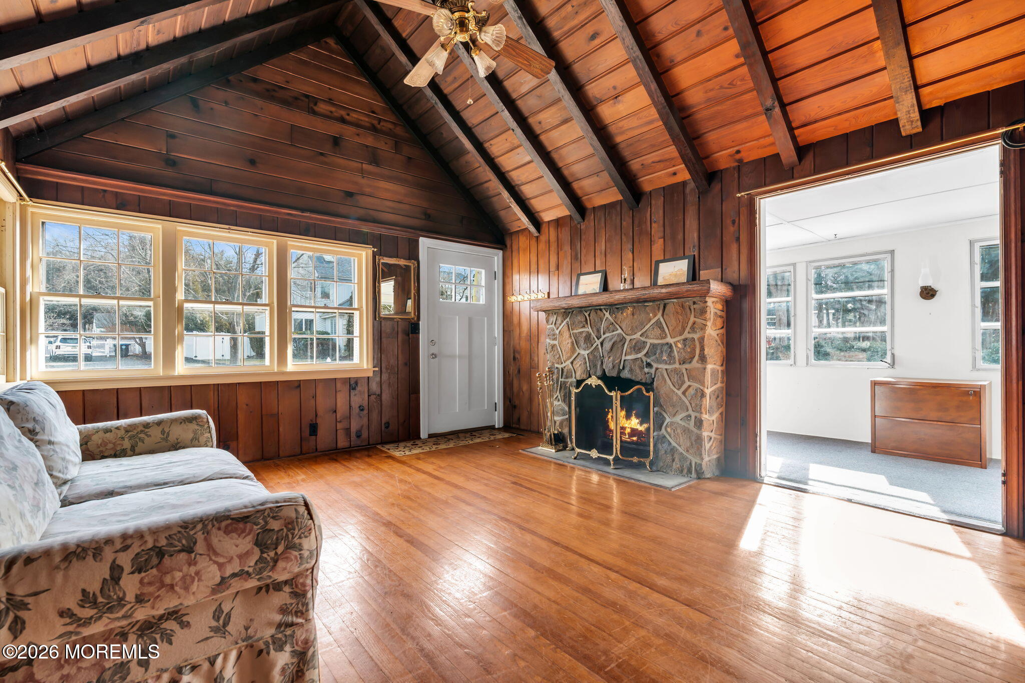 2609 River Road Manasquan, NJ 08736 - Photo 14 of 28 a view of livingroom with furniture window and fireplace