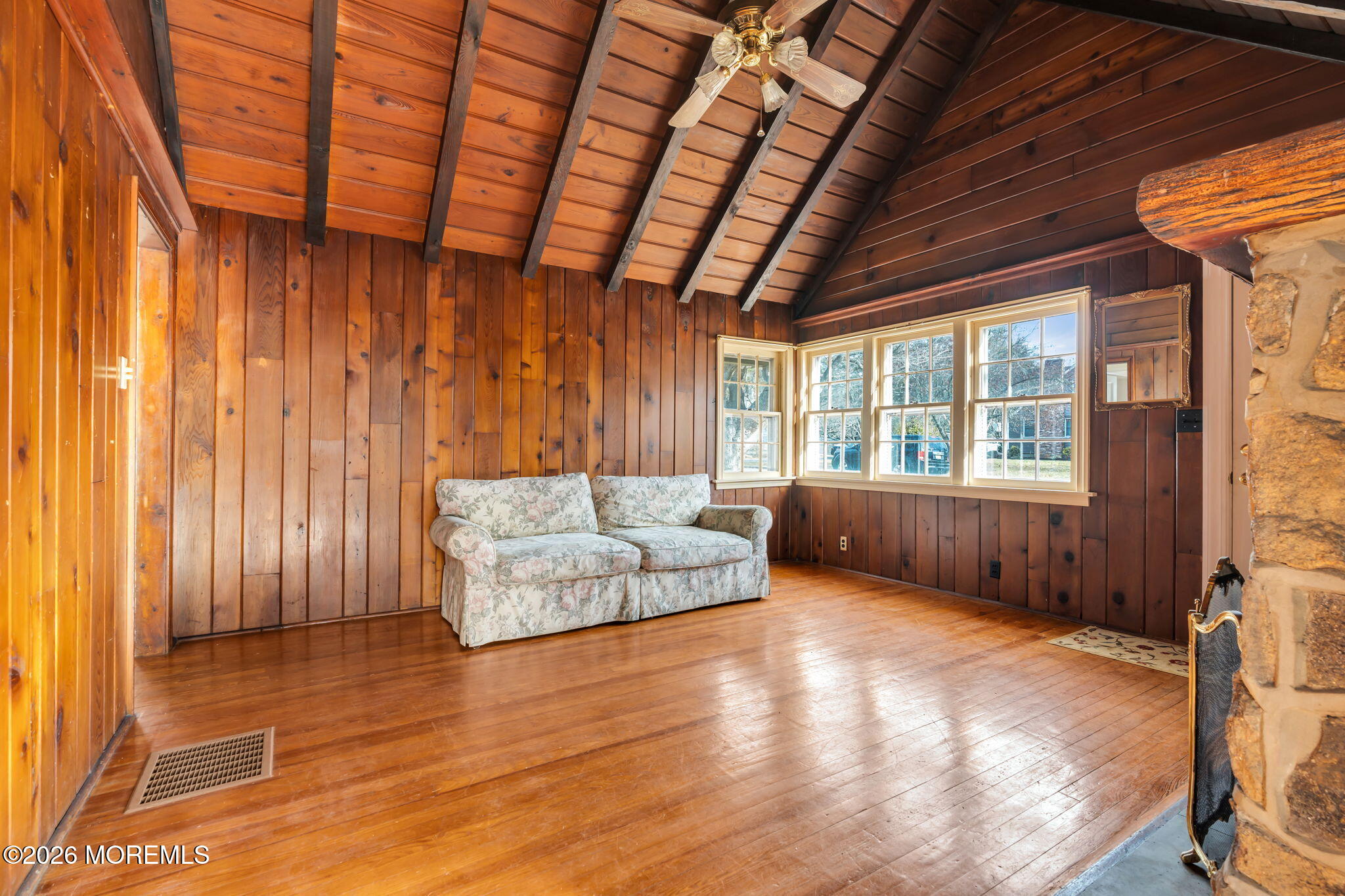 2609 River Road Manasquan, NJ 08736 - Photo 15 of 28 a living room with furniture and a large window
