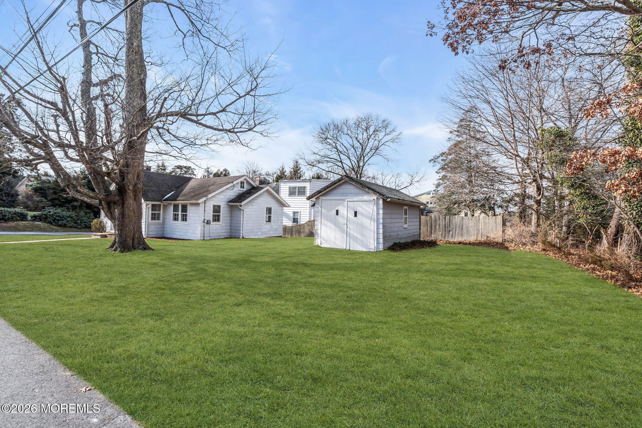 2609 River Road Manasquan, NJ 08736 - Photo 24 of 28 a house view with a garden space