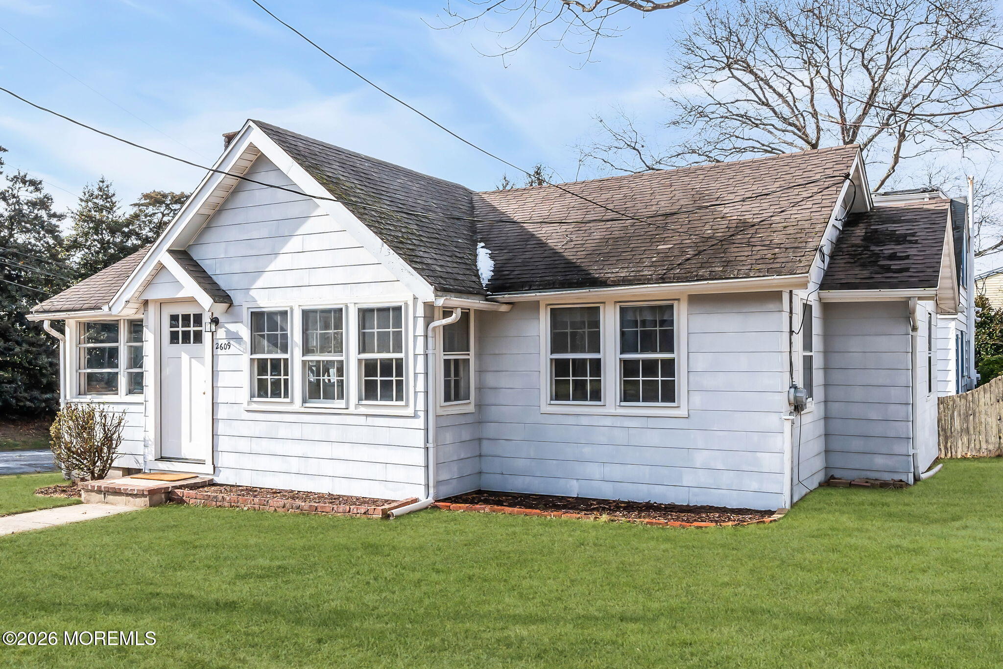 2609 River Road Manasquan, NJ 08736 - Photo 5 of 28 a view of a house with a yard