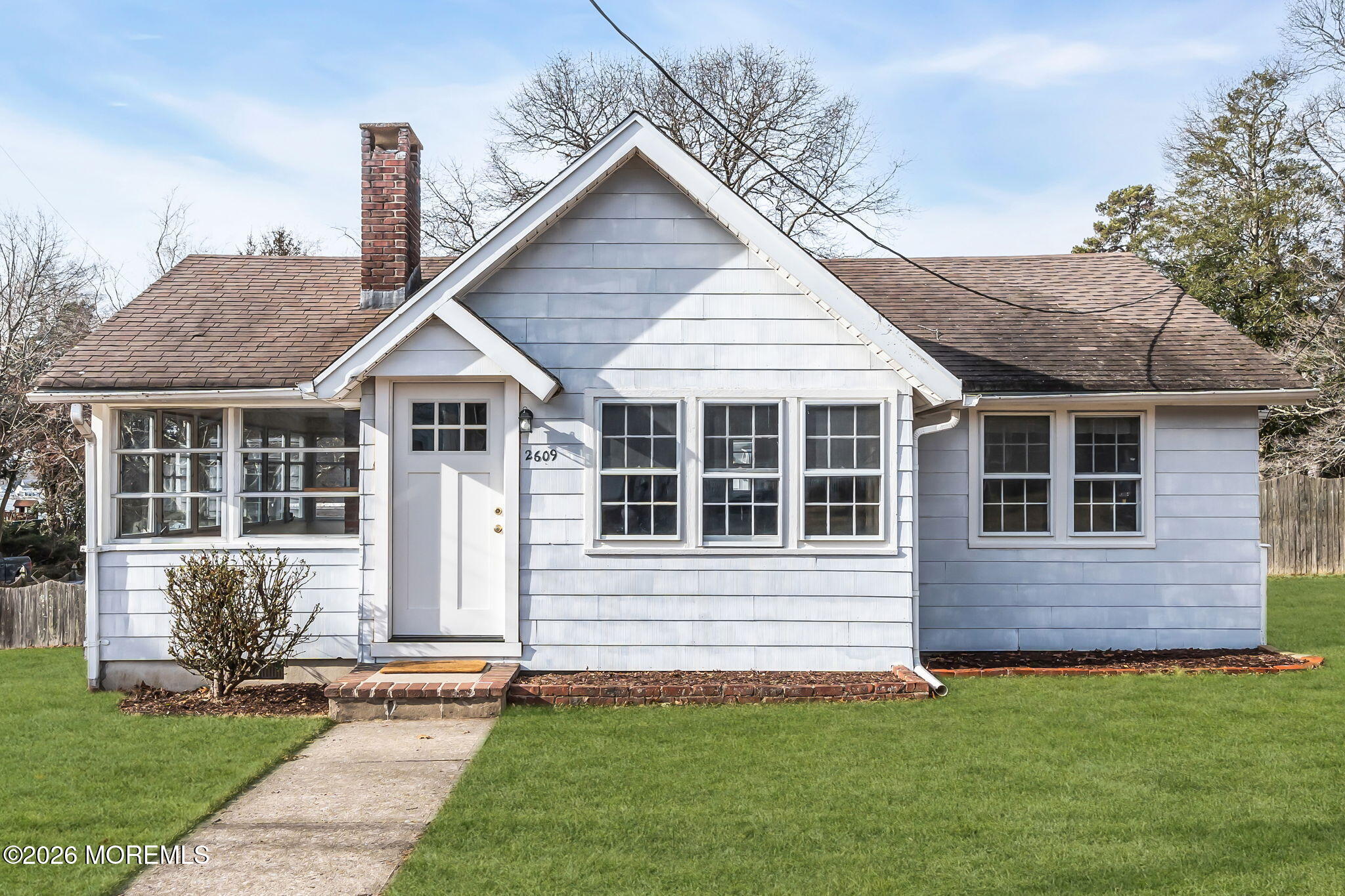 2609 River Road Manasquan, NJ 08736 - Photo 8 of 28 a view of a house with a yard