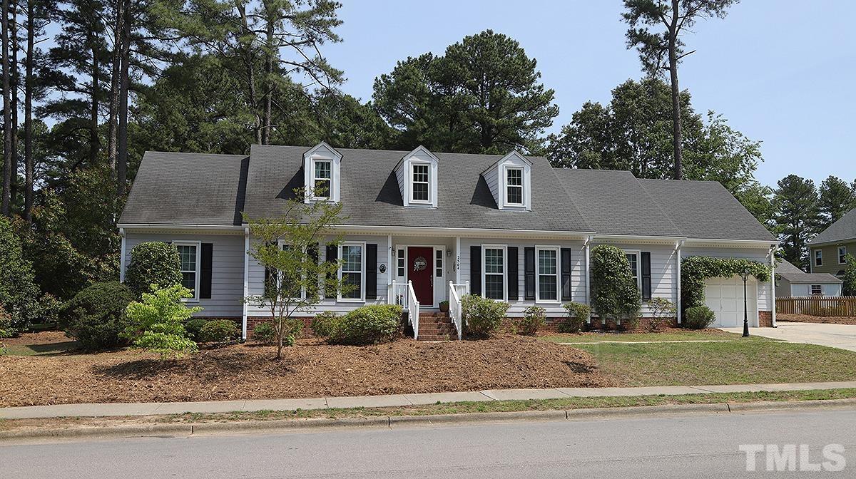 2504 Sawmill Road Raleigh, NC 27613 - Photo 1 of 13 front view of a house with a yard