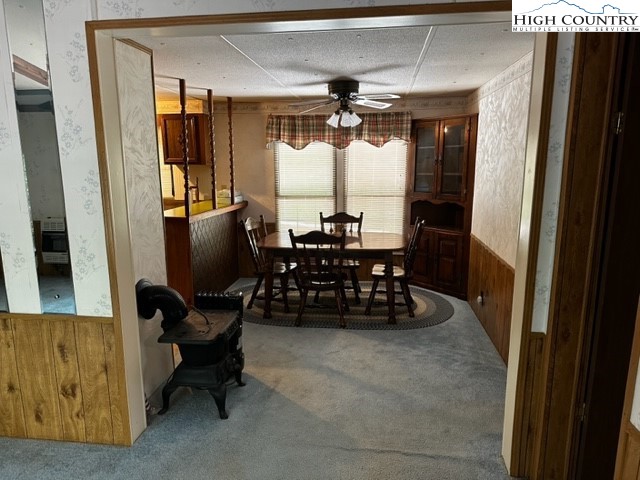 1426 Rainbow Trail Boone, NC 28607 - Photo 16 of 48 a dining room with furniture and a chandelier