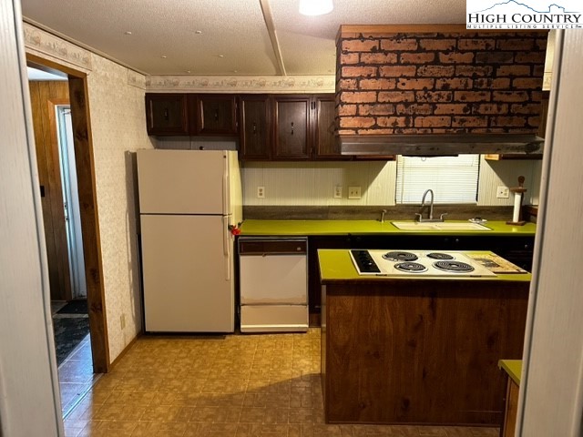 1426 Rainbow Trail Boone, NC 28607 - Photo 20 of 48 a view of a refrigerator and a stove