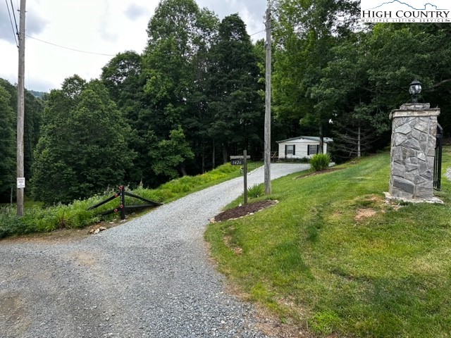 1426 Rainbow Trail Boone, NC 28607 - Photo 30 of 48 a view of a backyard with green space