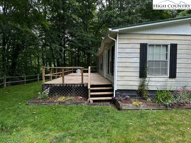 1426 Rainbow Trail Boone, NC 28607 - Photo 35 of 48 a front view of a house with a garden