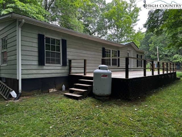 1426 Rainbow Trail Boone, NC 28607 - Photo 38 of 48 front view of a house with a yard
