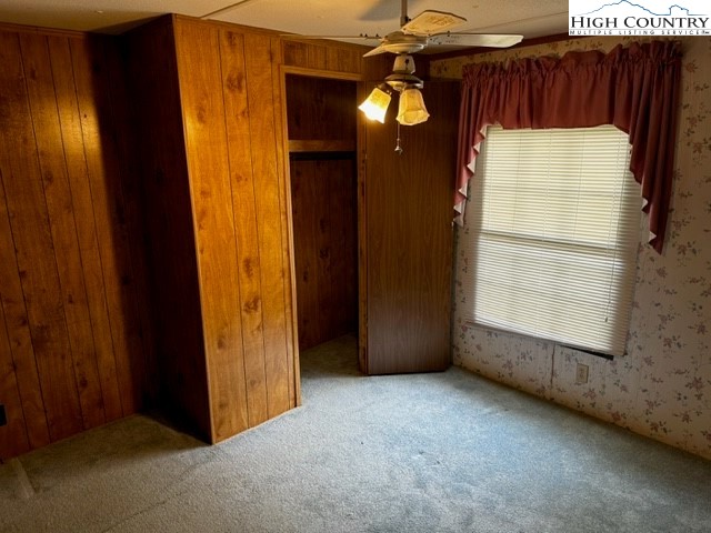 1426 Rainbow Trail Boone, NC 28607 - Photo 7 of 48 an empty room with windows and entrance