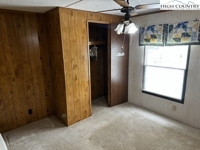 1426 Rainbow Trail Boone, NC 28607 - Photo 8 of 48 an empty room with window cabinet and door