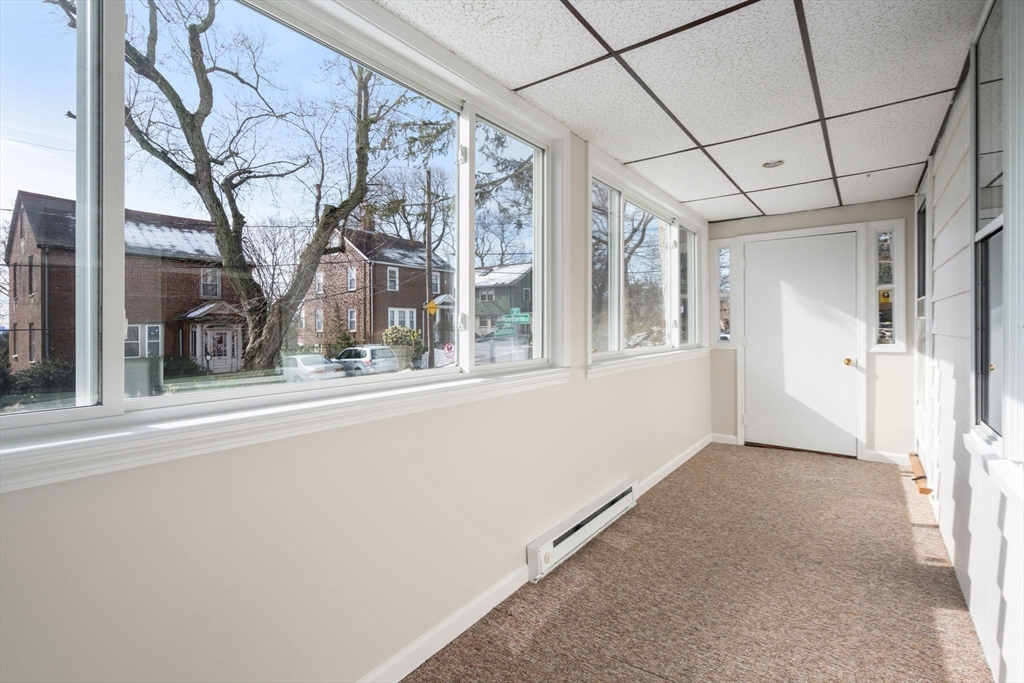 89 Coolidge Road Arlington, MA 02476 - Photo 11 of 22 a view of a house with a street