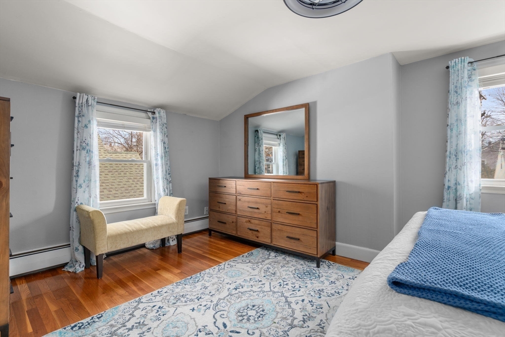 64 Newfield Street Boston, MA 02132 - Photo 19 of 36 a living room with furniture and a window