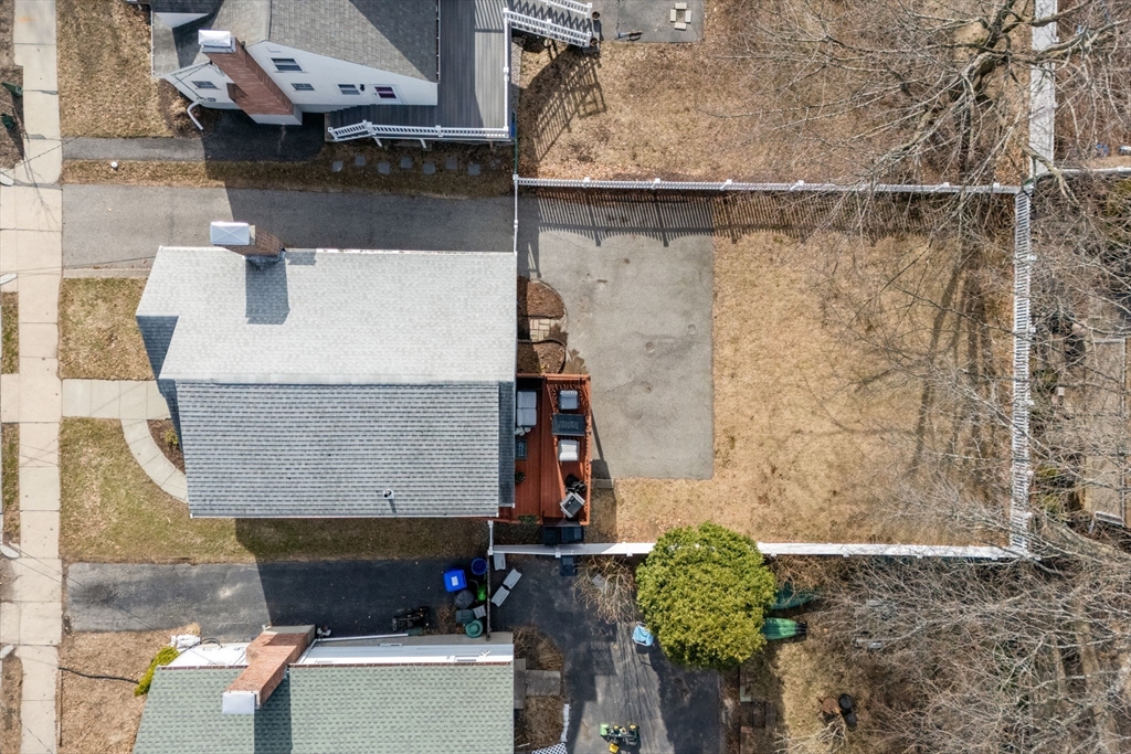 64 Newfield Street Boston, MA 02132 - Photo 34 of 36 an aerial view of residential houses with outdoor space
