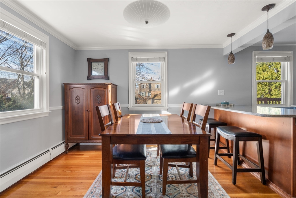 64 Newfield Street Boston, MA 02132 - Photo 10 of 36 a view of a dining room with furniture window and outside view