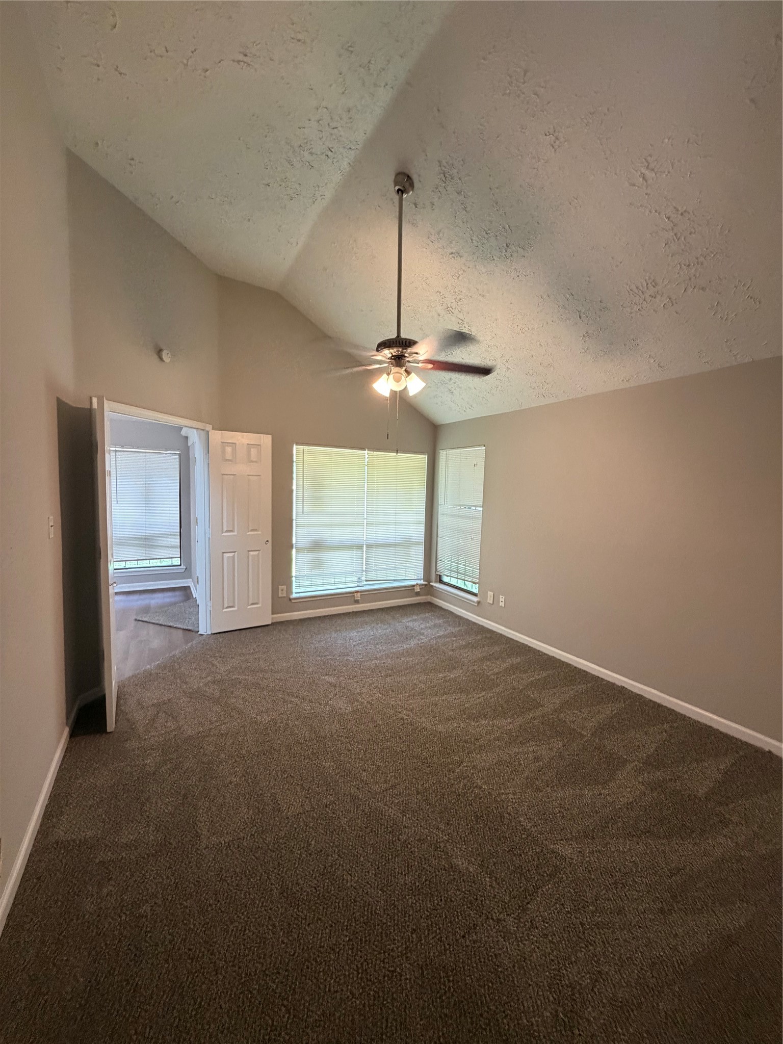 8662 Pearl Point Street Houston, TX 77044 - Photo 9 of 28 a view of an empty room with a window