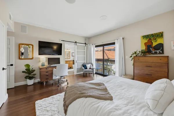 a bedroom with a bed and furniture