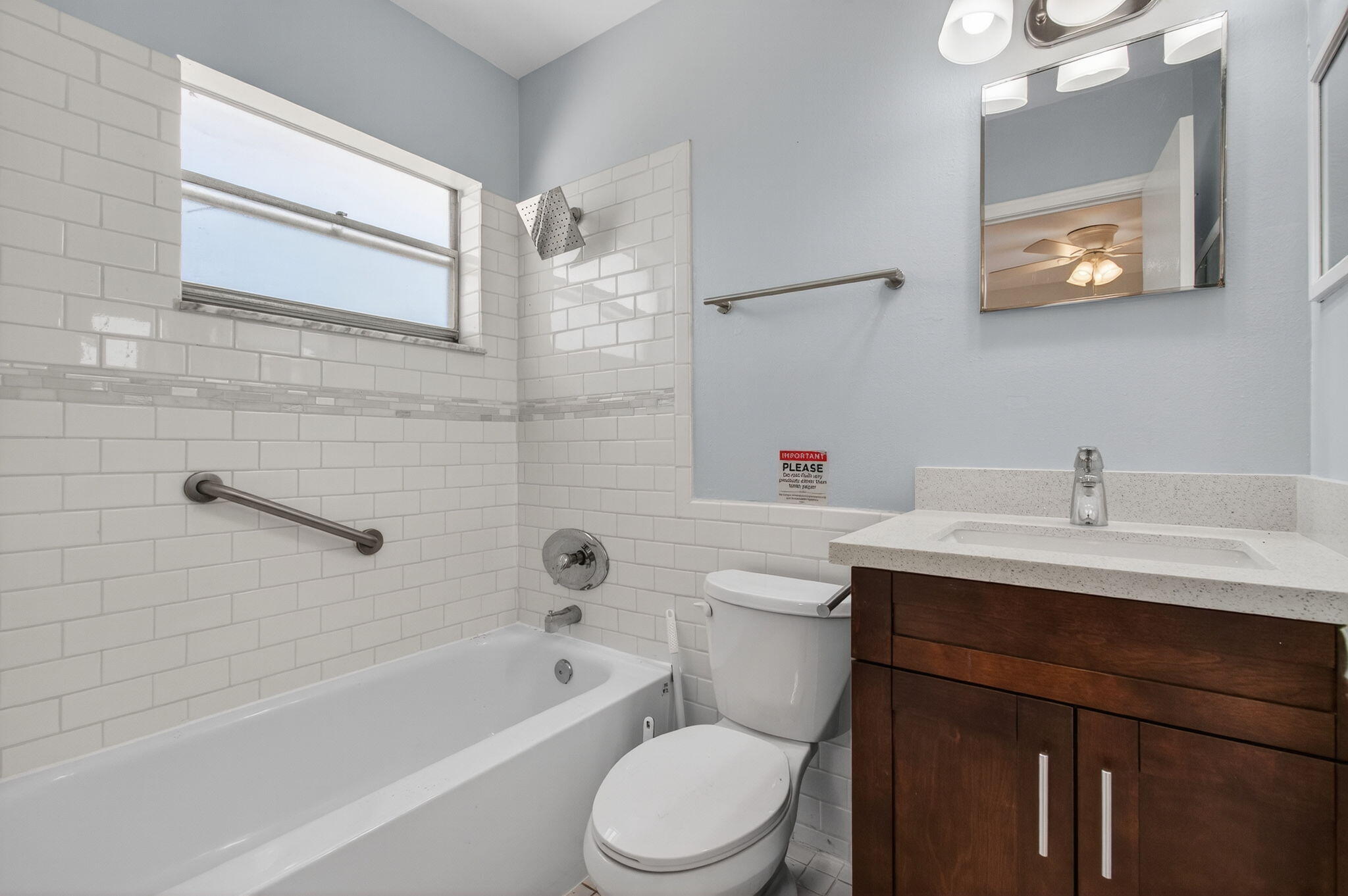 109 Southeast 11th Avenue, Unit 13 Pompano Beach, FL 33060 - Photo 17 of 37 a bathroom with a sink a toilet and shower