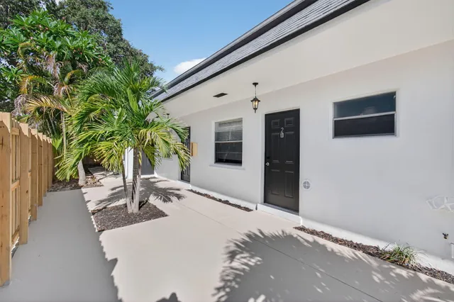 a view of a backyard of a house