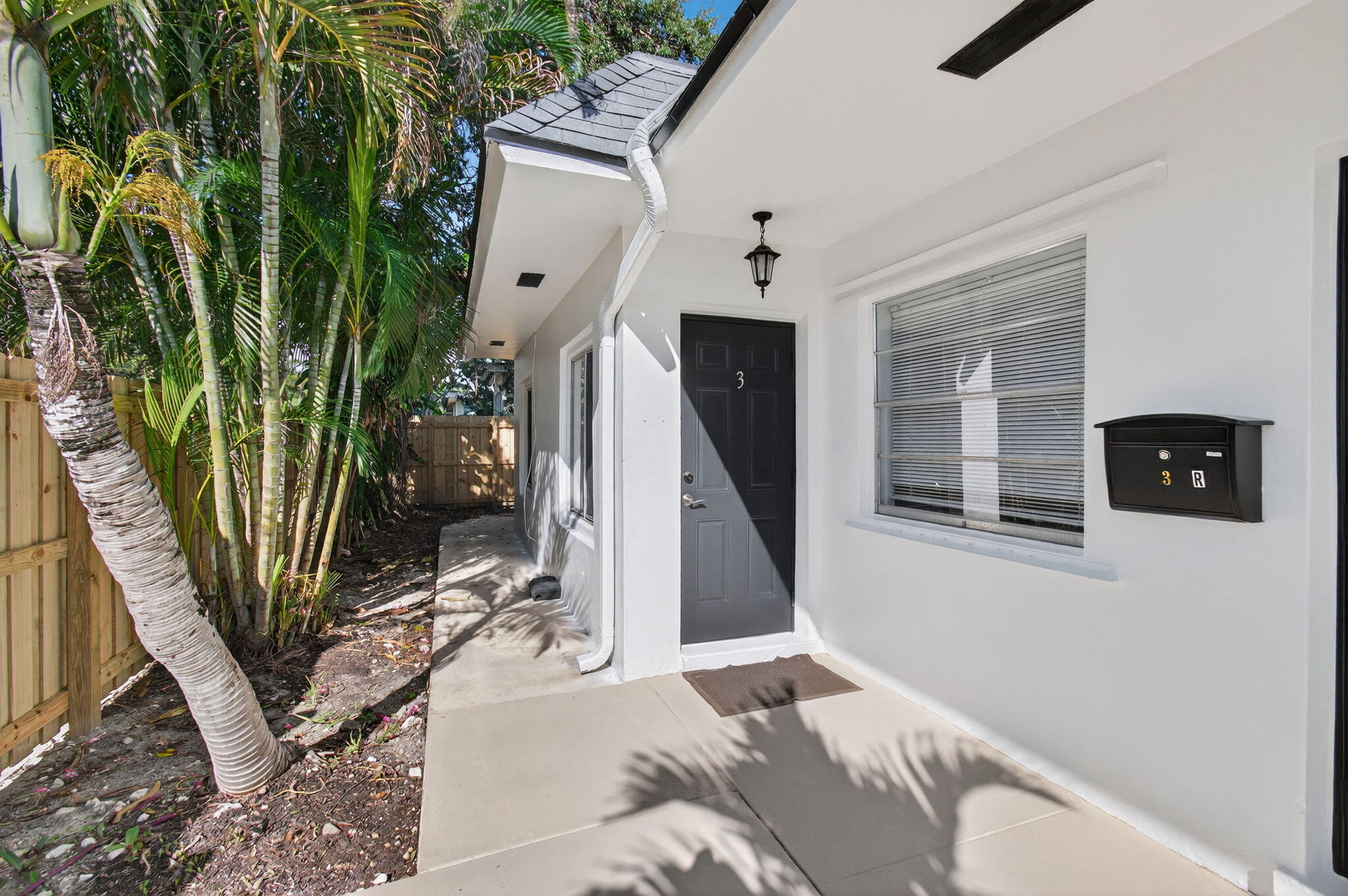 109 Southeast 11th Avenue, Unit 13 Pompano Beach, FL 33060 - Photo 36 of 37 a view of a livingroom with furniture and staircase