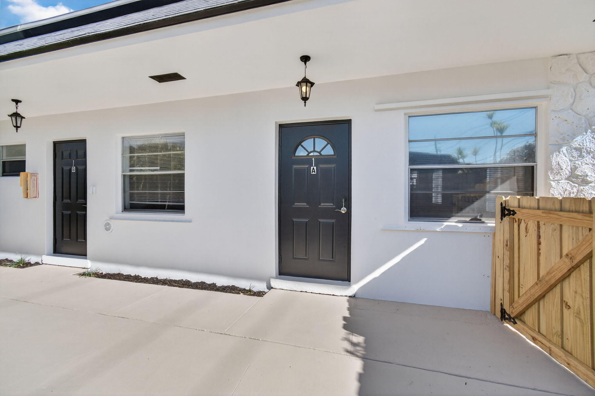 109 Southeast 11th Avenue, Unit 13 Pompano Beach, FL 33060 - Photo 5 of 37 a view of a hallway with a living room