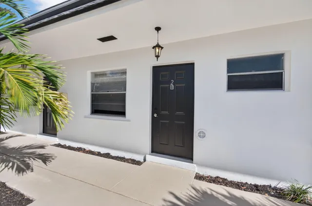 a view of a livingroom with a flat screen tv