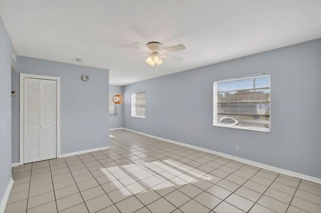 a view of an empty room and window