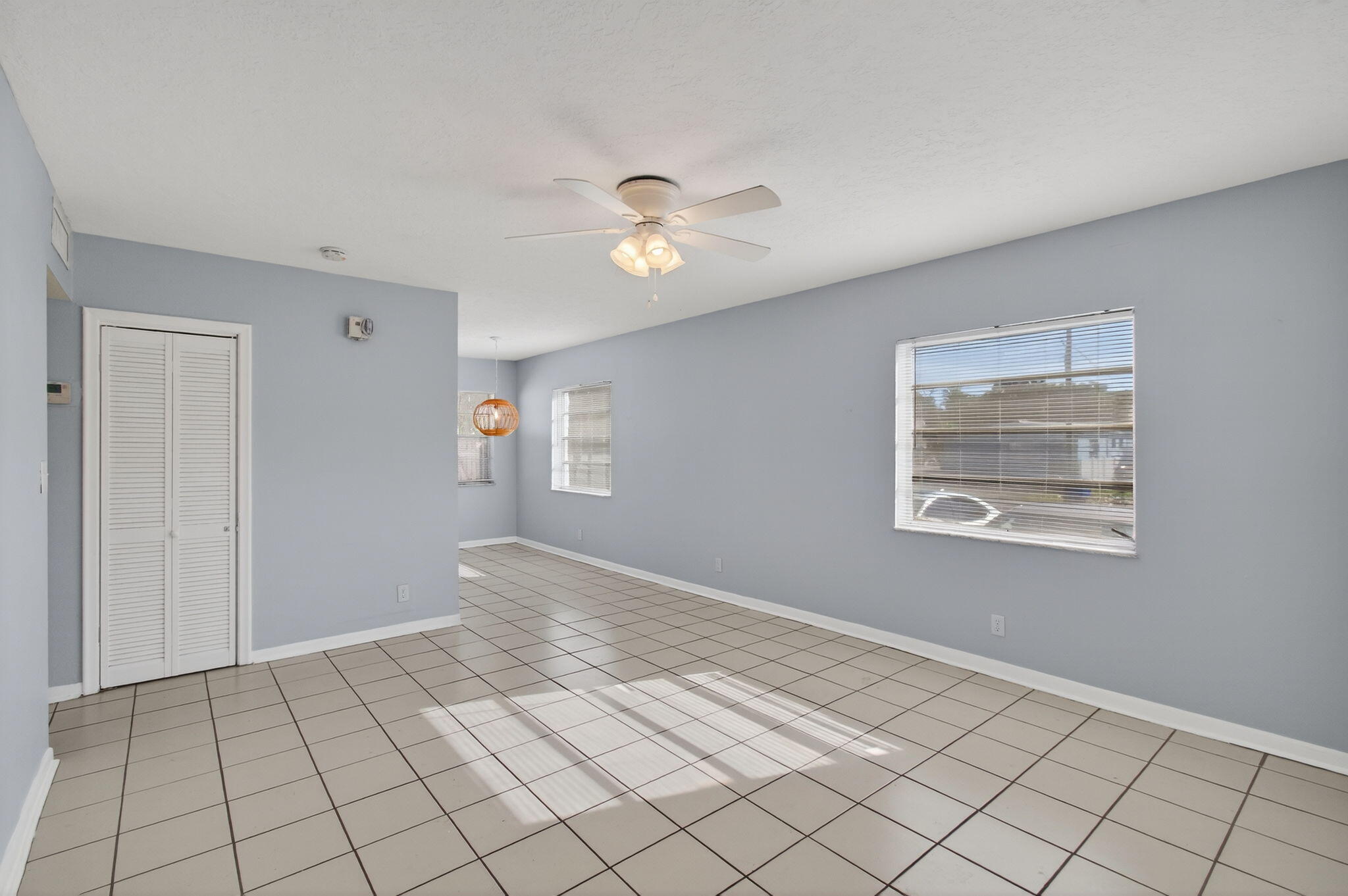 109 Southeast 11th Avenue, Unit 13 Pompano Beach, FL 33060 - Photo 7 of 37 a view of an empty room and window