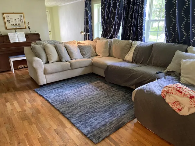 a living room with furniture and a couch