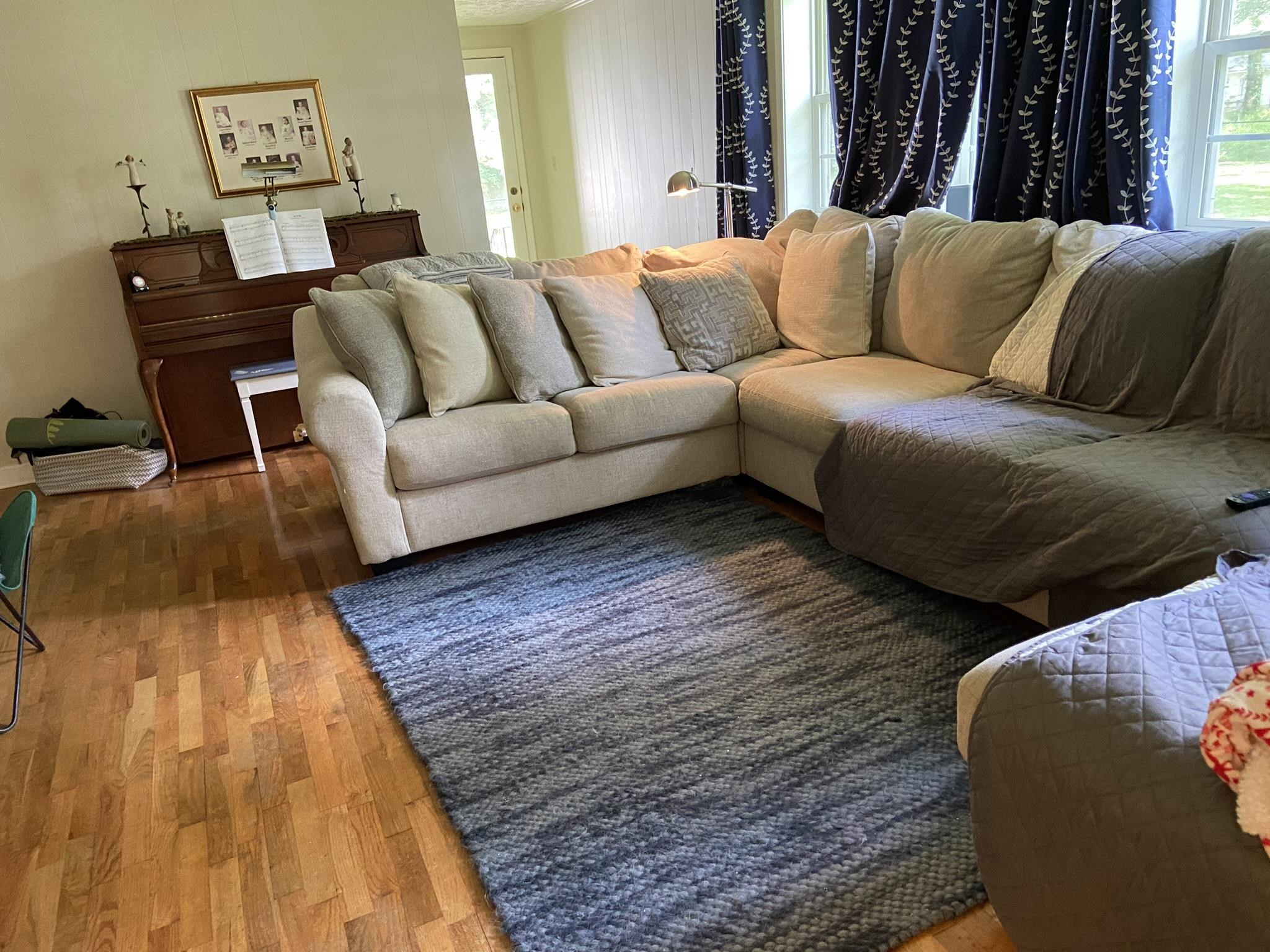 225 East 3rd Street Henderson, TN 38340 - Photo 14 of 22 a living room with a couch and a rug