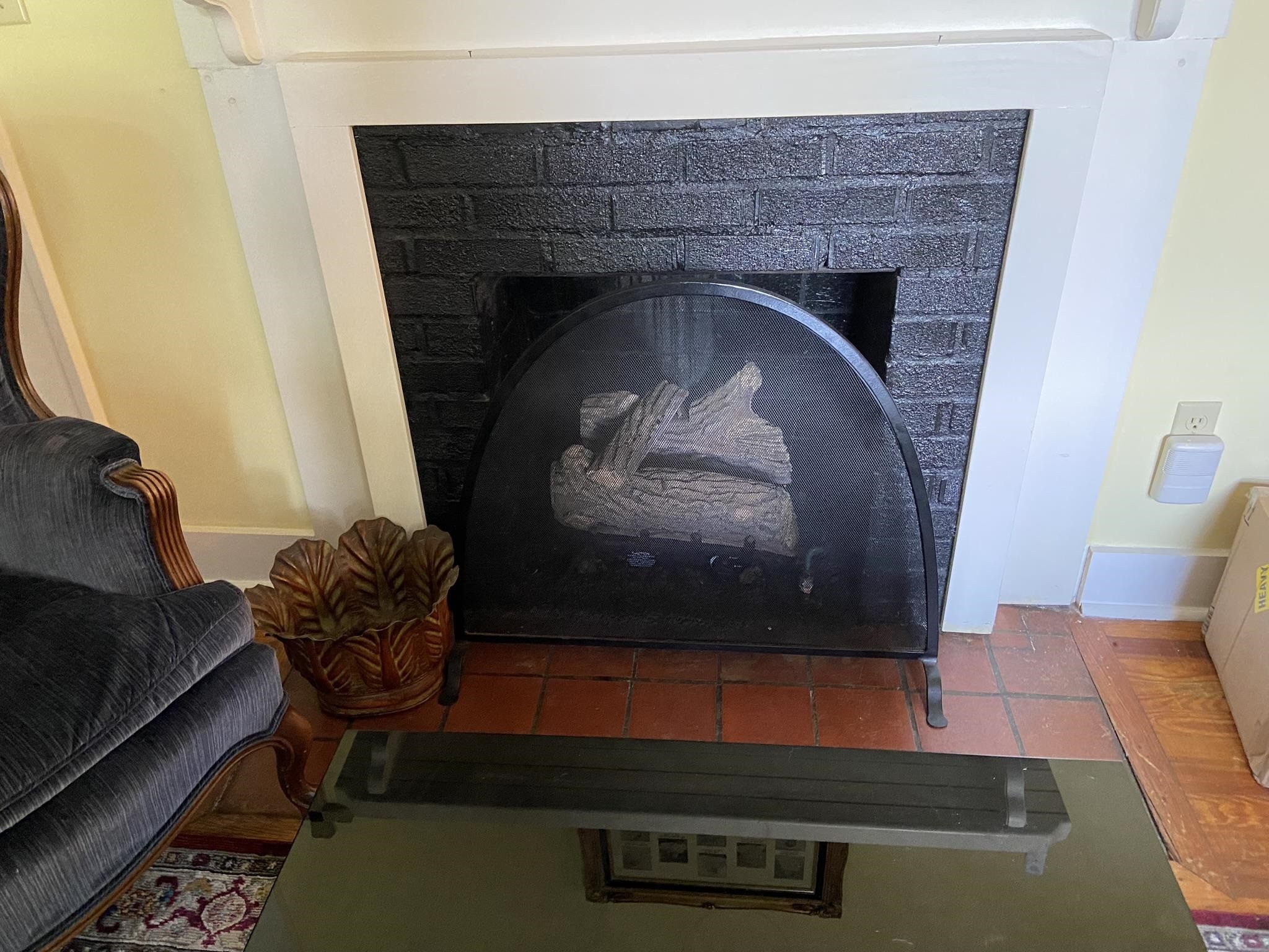 225 East 3rd Street Henderson, TN 38340 - Photo 16 of 22 a living room with furniture and a fireplace