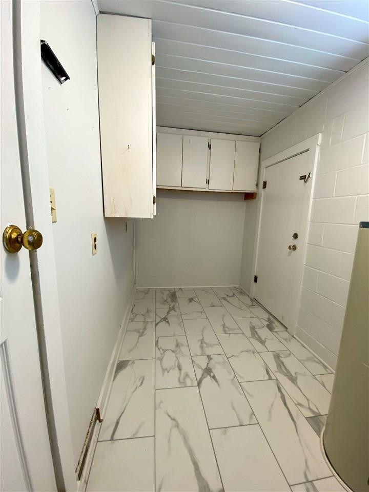 225 East 3rd Street Henderson, TN 38340 - Photo 22 of 22 a view of a utility room with a sink
