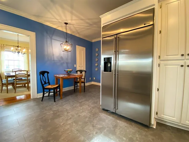 a room with furniture and a window