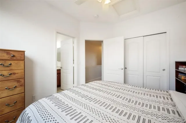 a bathroom with a sink toilet a mirror and shower