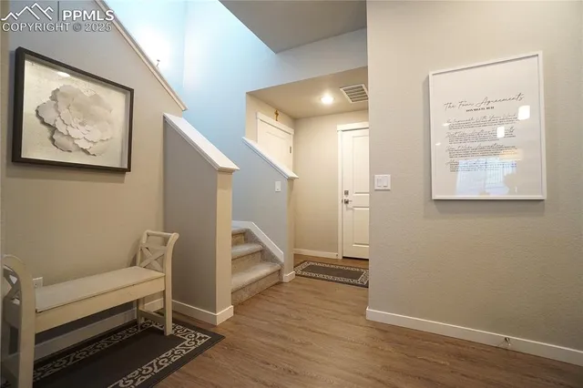 a view of livingroom with furniture and wooden floor