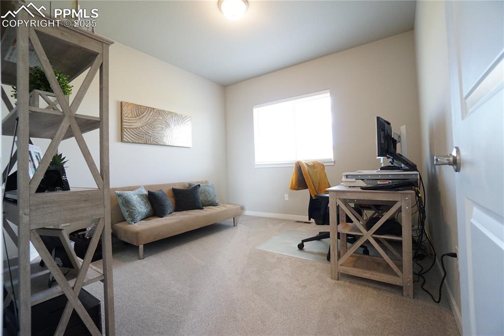 5309 Passport View Colorado Springs, CO 80922 - Photo 17 of 33 a work room with furniture and a window