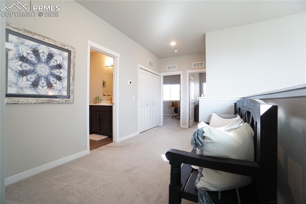 5309 Passport View Colorado Springs, CO 80922 - Photo 20 of 33 a living room with furniture and a table