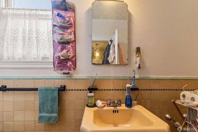 a bathroom with a sink and a bathtub