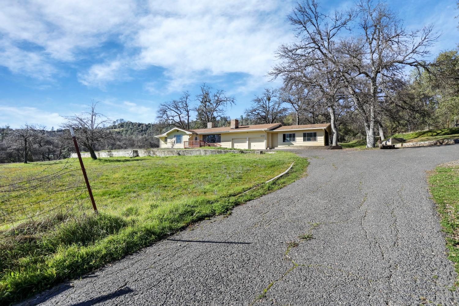 20200 Tuolumne Road North Tuolumne, CA 95379 - Photo 2 of 43 a view of a house with a yard