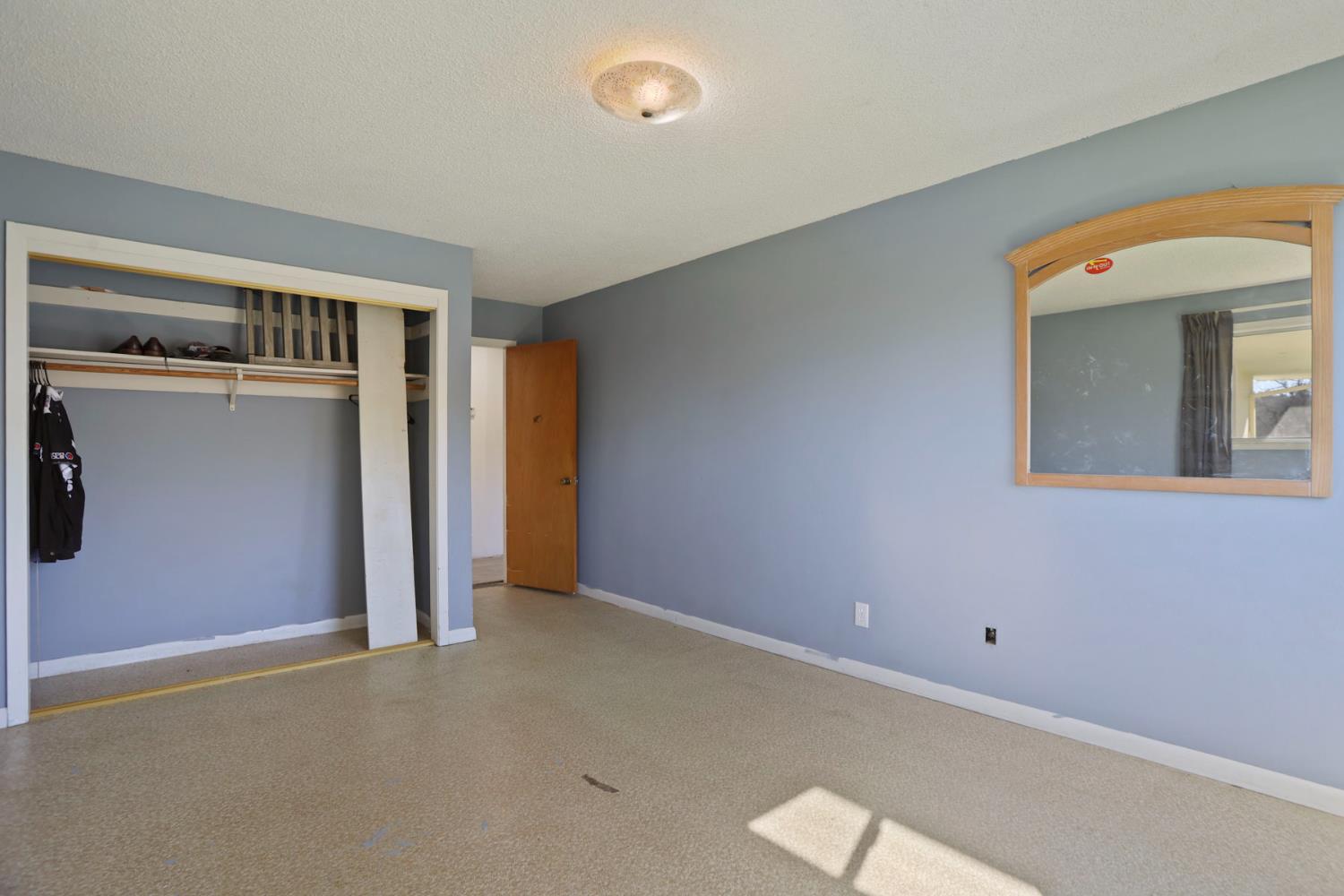 20200 Tuolumne Road North Tuolumne, CA 95379 - Photo 25 of 43 an empty room with window