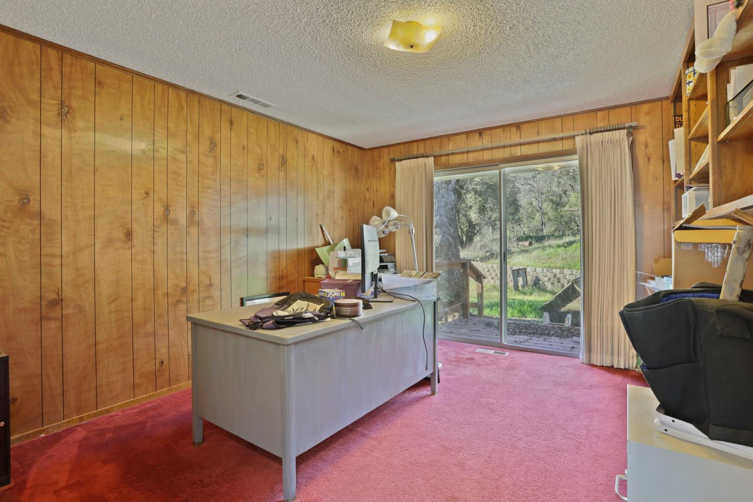 20200 Tuolumne Road North Tuolumne, CA 95379 - Photo 26 of 43 a kitchen that has a stove and a sink