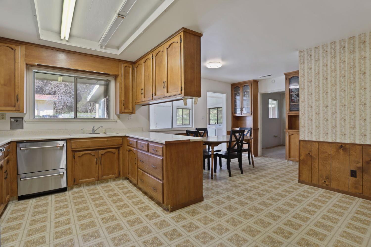 20200 Tuolumne Road North Tuolumne, CA 95379 - Photo 32 of 43 a kitchen with a cabinets and counter space