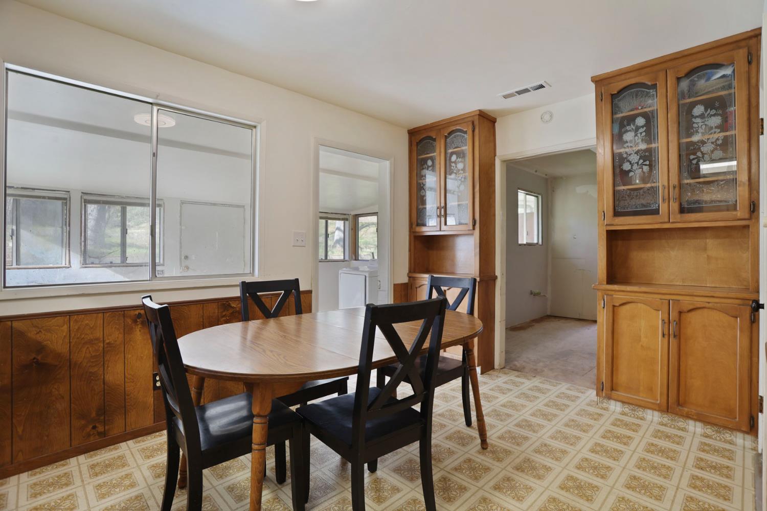 20200 Tuolumne Road North Tuolumne, CA 95379 - Photo 36 of 43 a dining room with furniture and window