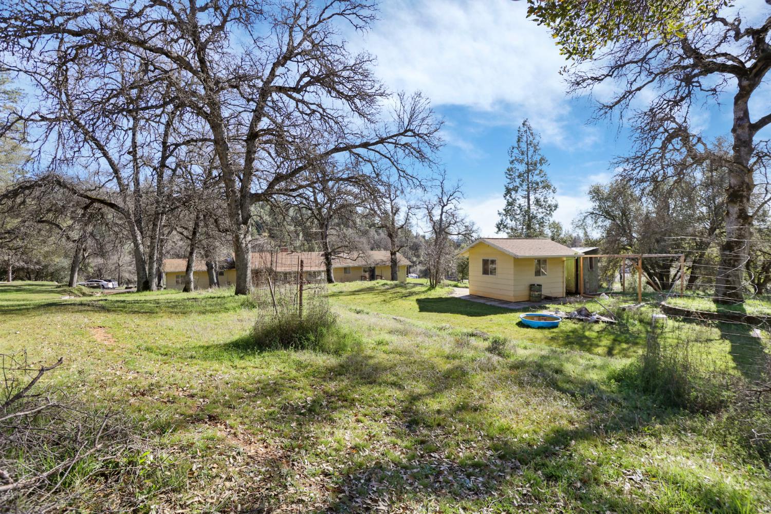 20200 Tuolumne Road North Tuolumne, CA 95379 - Photo 10 of 43 a view of a house with a yard