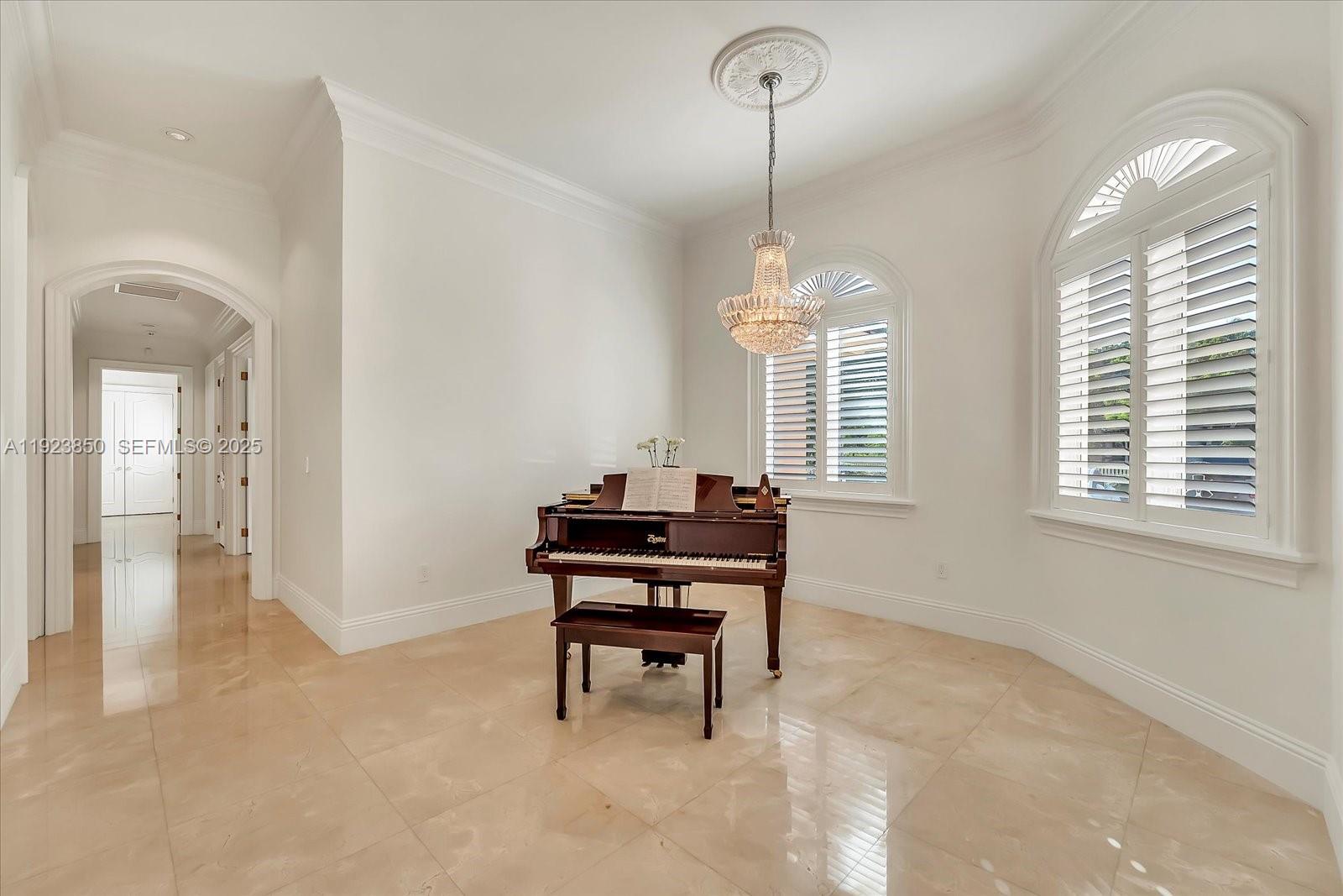 18611 Southwest 122nd Street Miami, FL 33196 - Photo 17 of 55 a room with furniture piano and a window