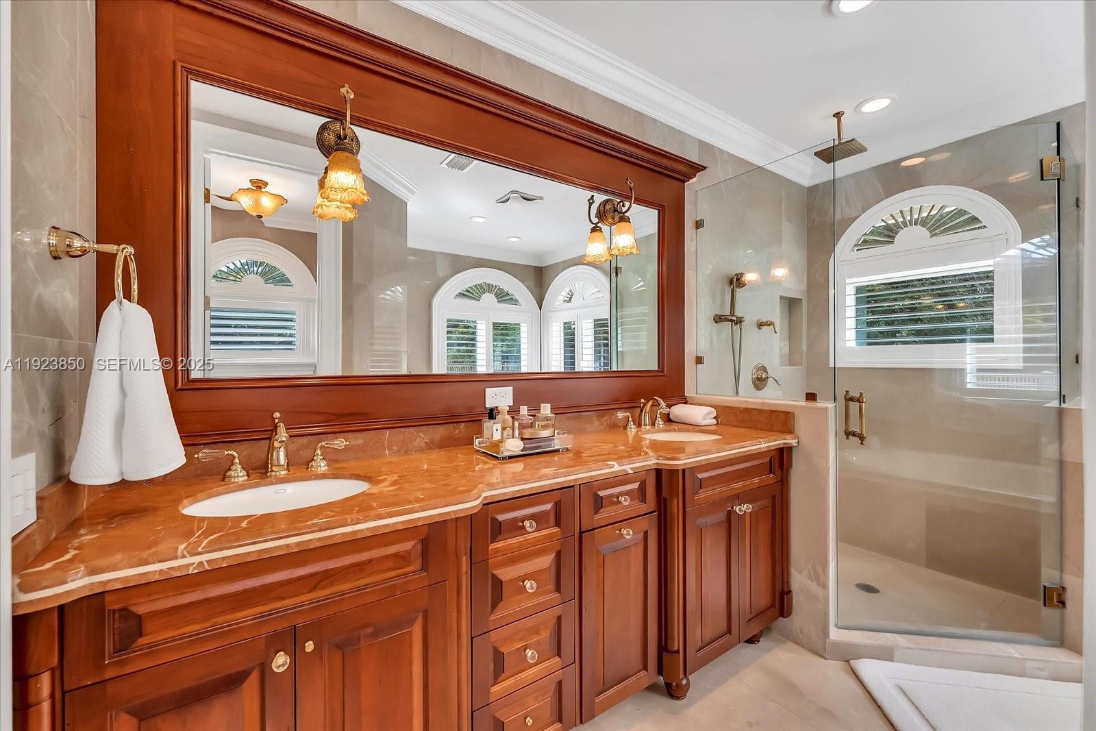 18611 Southwest 122nd Street Miami, FL 33196 - Photo 28 of 55 a bathroom with a granite countertop sink mirror and window