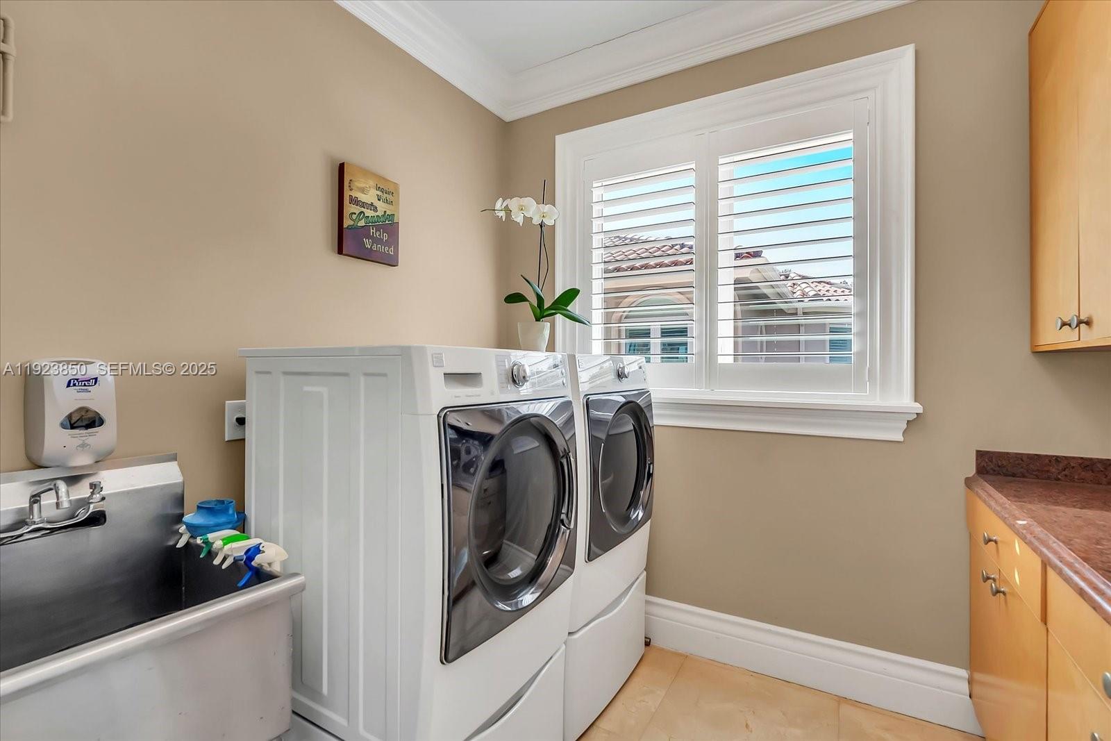 18611 Southwest 122nd Street Miami, FL 33196 - Photo 49 of 55 a utility room with sink dryer and washer