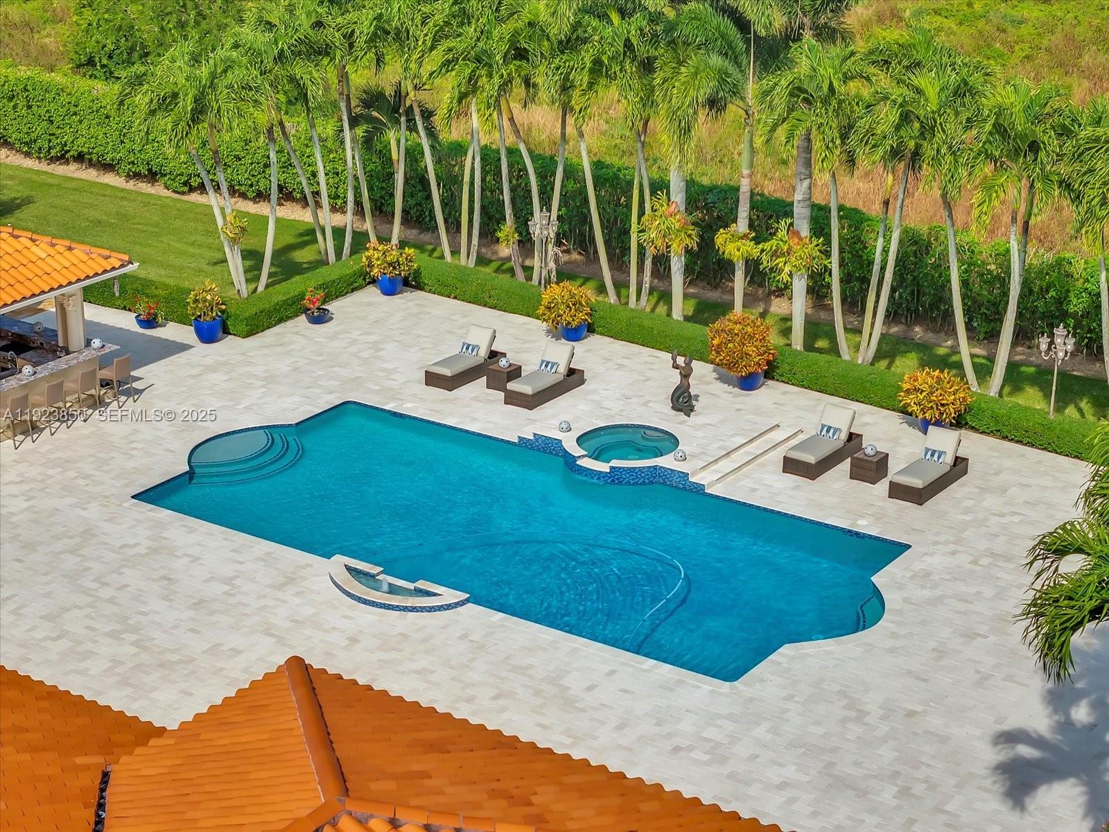 18611 Southwest 122nd Street Miami, FL 33196 - Photo 52 of 55 a view of a backyard with a patio