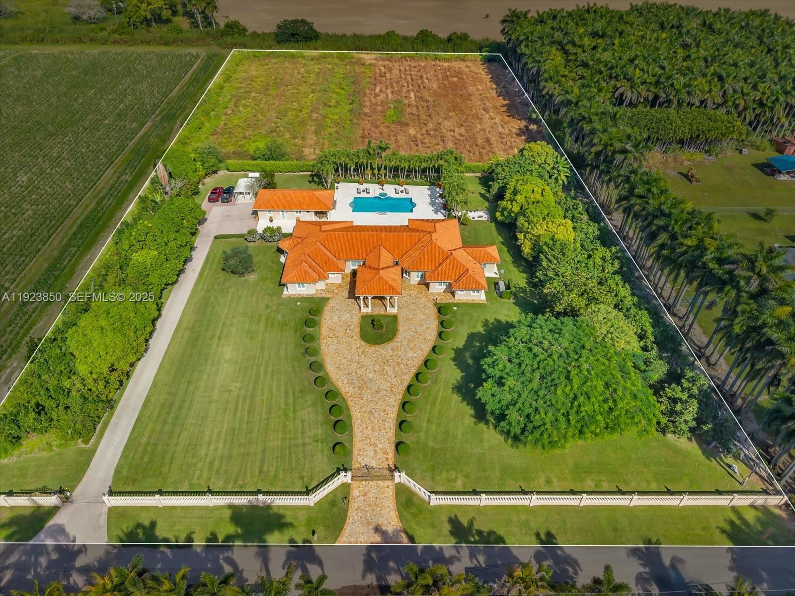 18611 Southwest 122nd Street Miami, FL 33196 - Photo 53 of 55 an aerial view of a tennis court