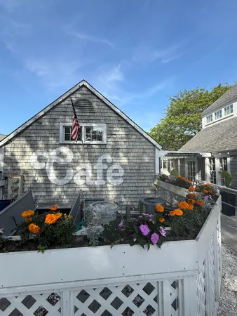 a black car parked in front of a building