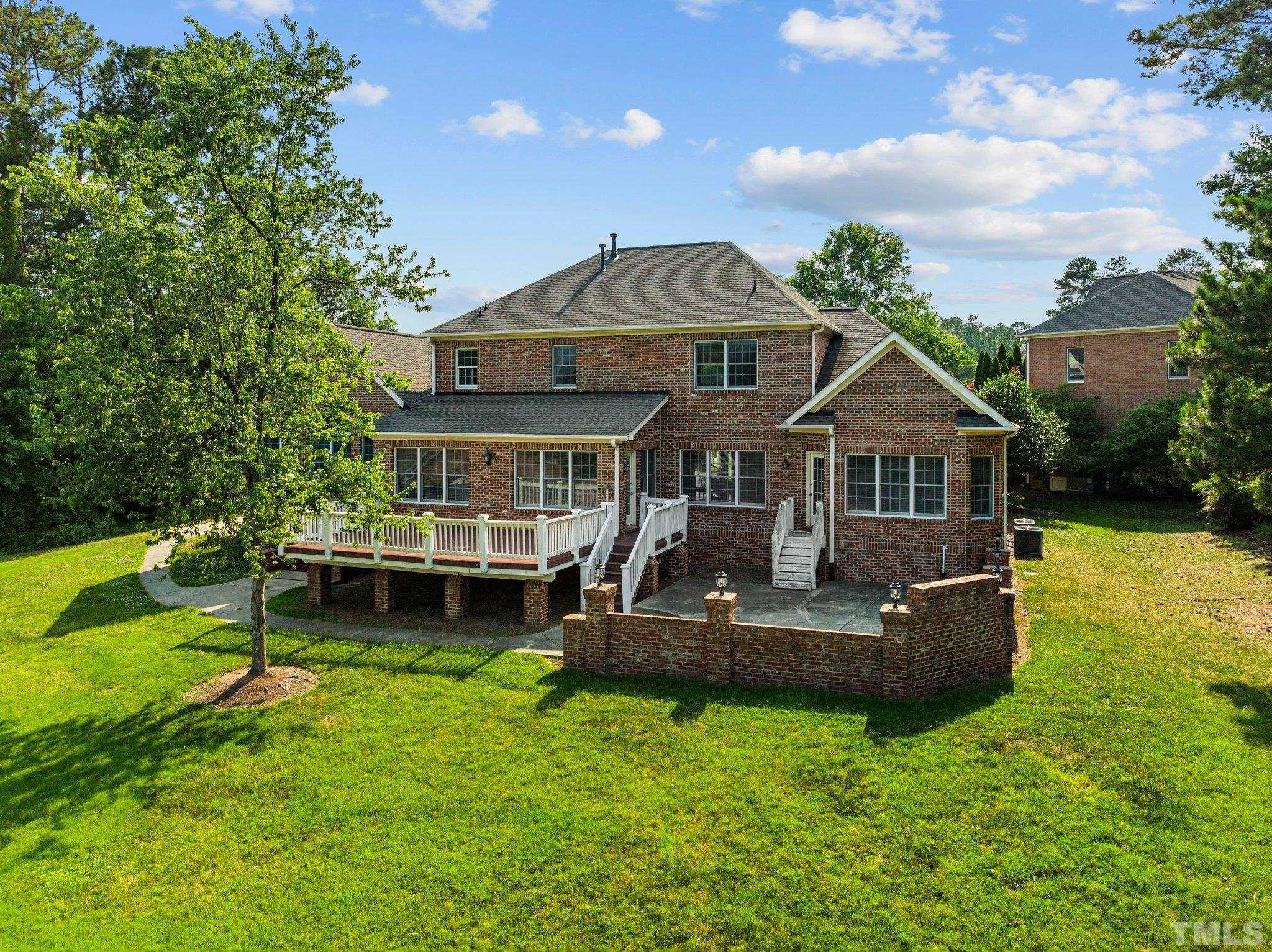 9501 Bluemont Court Raleigh, NC 27617 - Photo 11 of 85 a front view of house with yard and green space