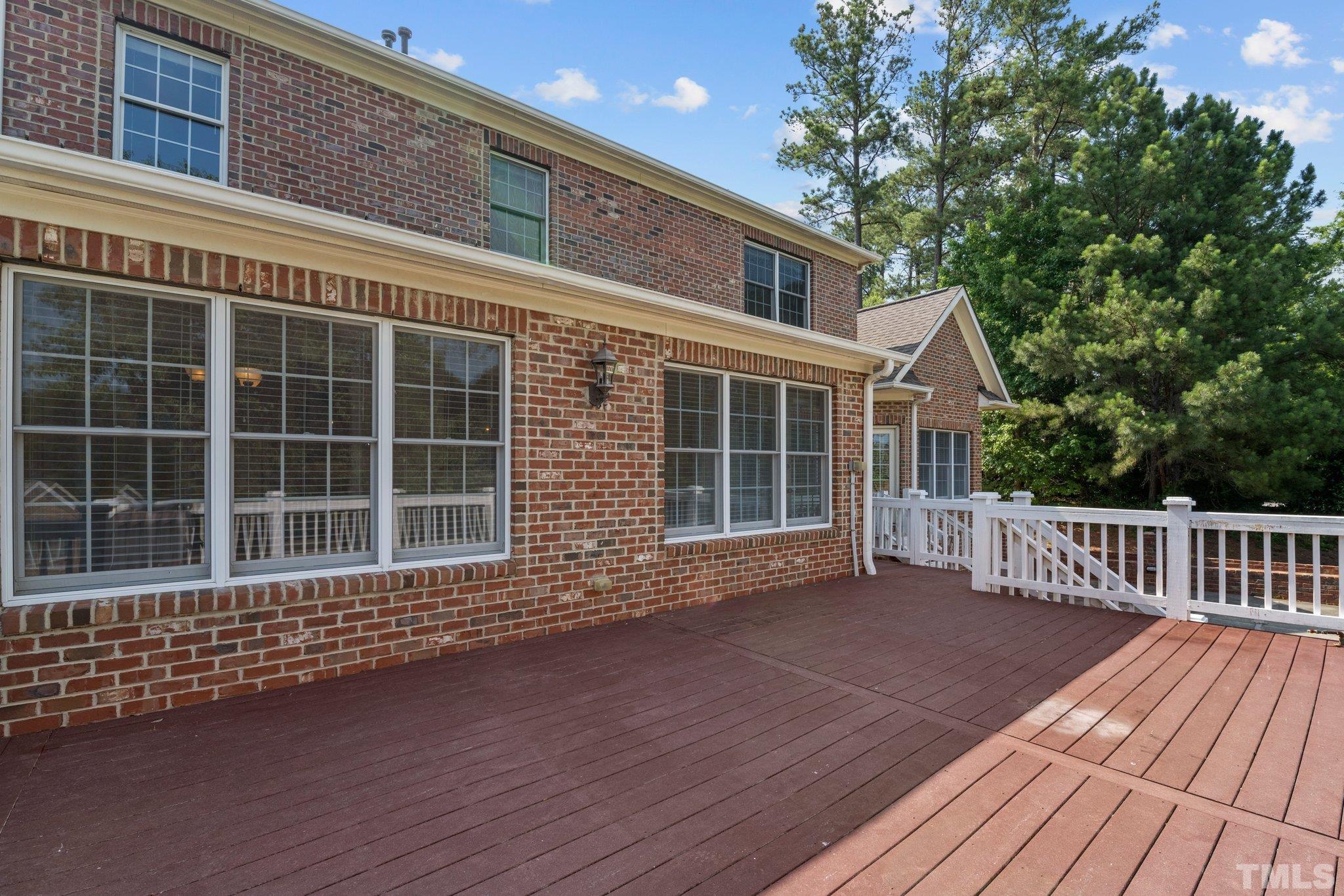 9501 Bluemont Court Raleigh, NC 27617 - Photo 14 of 85 a view of a house with a large window